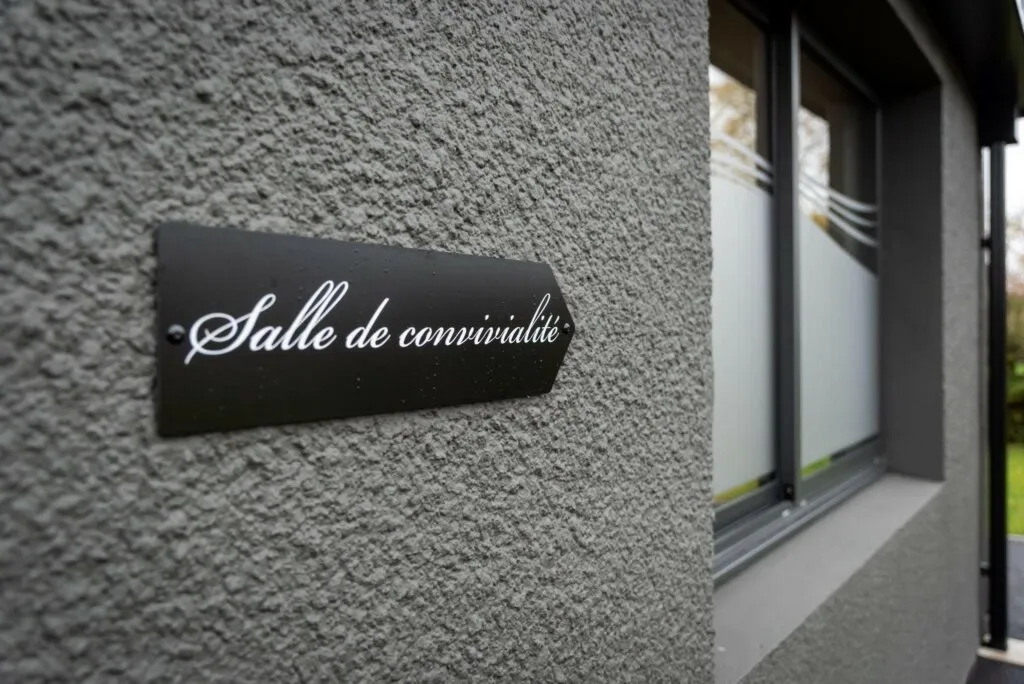 Plaque d'indication de la salle de convivialité